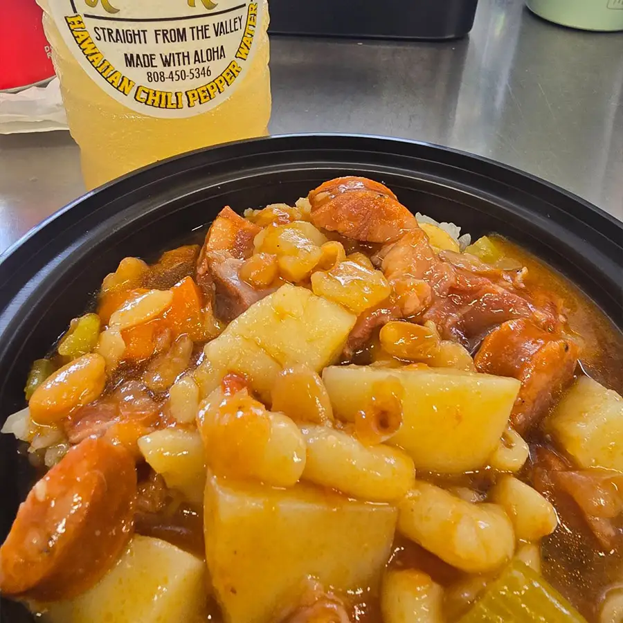 Portuguese Bean Soup, a hearty stew with potatoes, sausage, and beans, reflecting Pua's Plate Lunch Hawaiian cuisine.